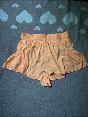 Free People Movement FPM Orange peach large athletic shorts